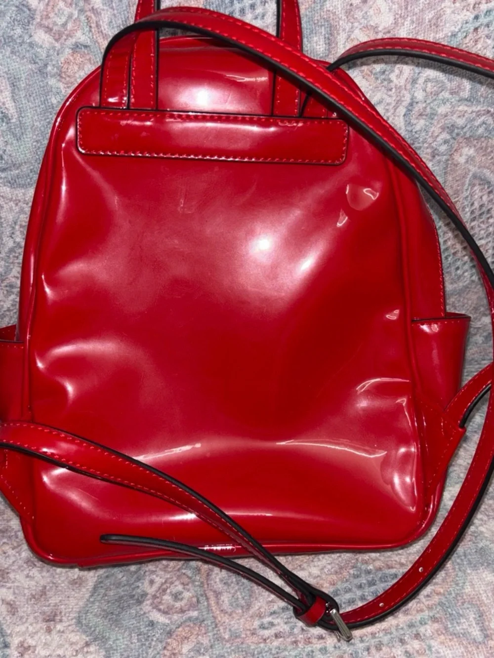 GUESS Red Patent Backpack with Triangle Charm